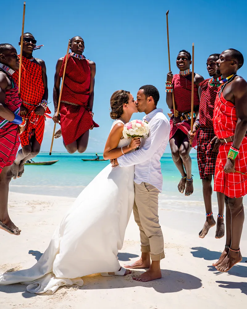 Massai dancer celebrate couple at ;atemwe beach venue