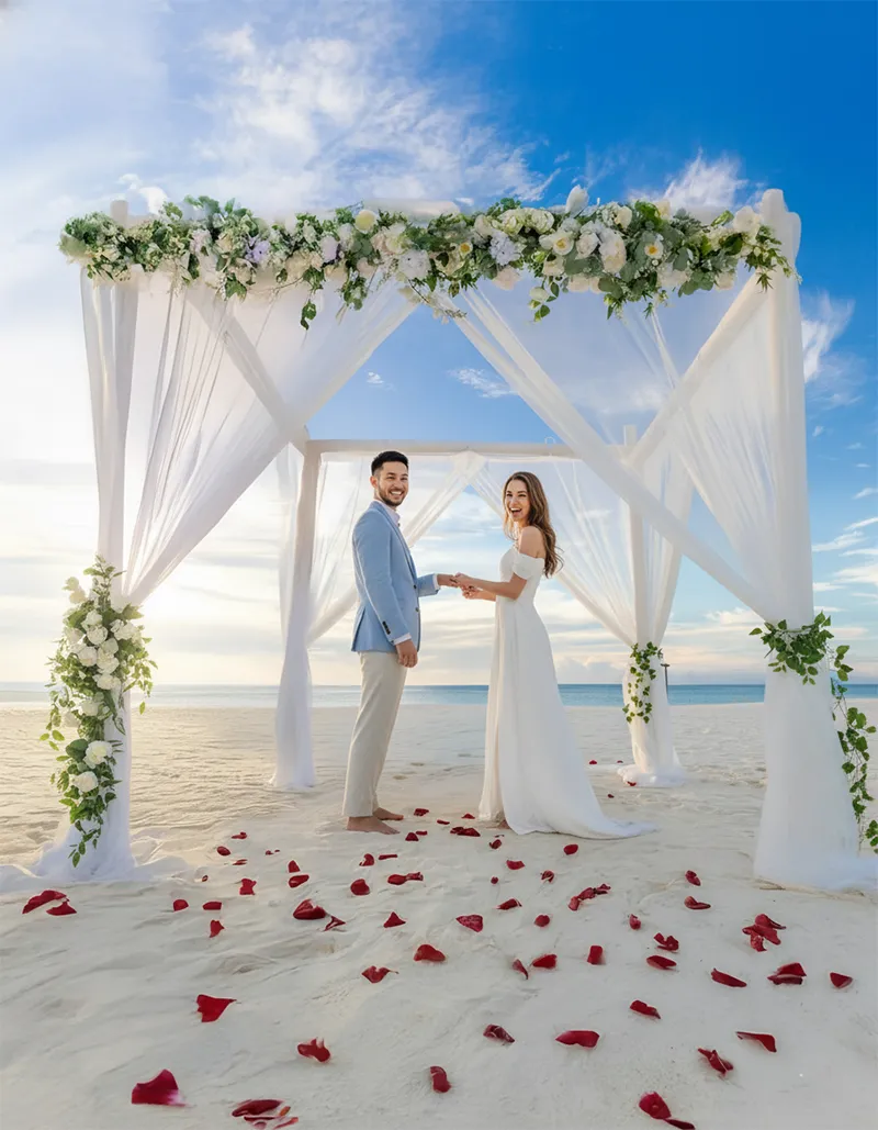 Couple walking the shoreline after the ceremony at Nungwi Beach Zanzibar