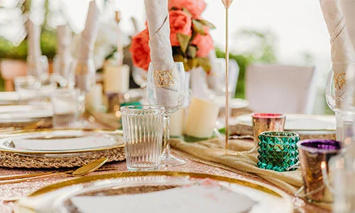 Elegant reception table decor and floral arrangements for a luxury Zanzibar wedding celebration.